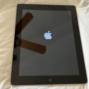 Preowned IPad 2 with power cord. Wi-Fi only
